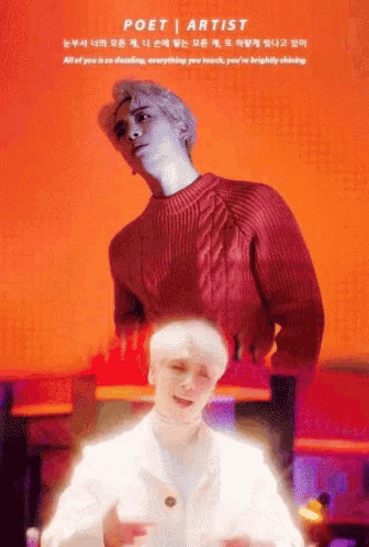 a man in a red sweater stands next to another man in a white jacket with the words poet artist on the bottom