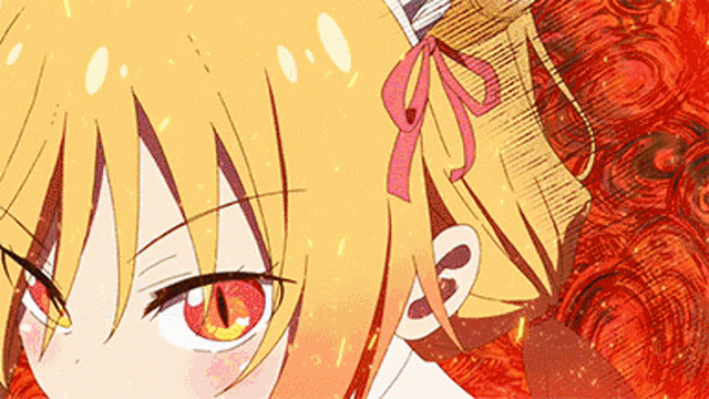 a close up of a girl with red eyes