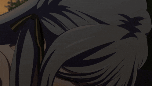 a close up of a person 's hair in the dark