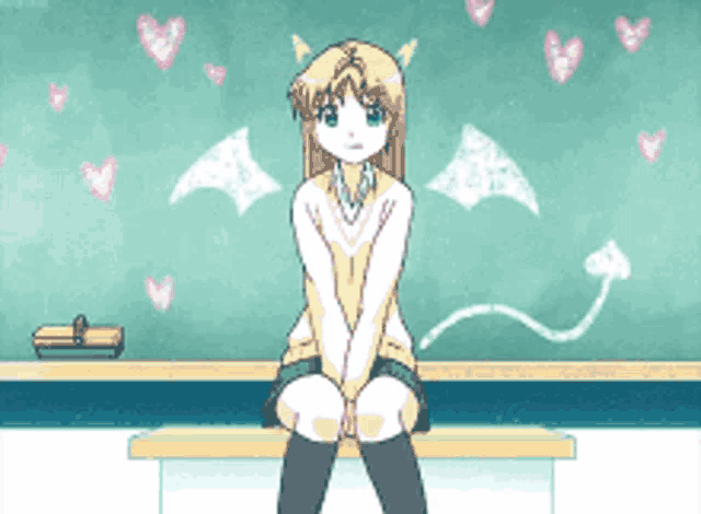 a girl with horns is sitting on a bench in front of a blackboard