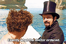 a man in a top hat says exactly what the doctor ordered while talking to another man