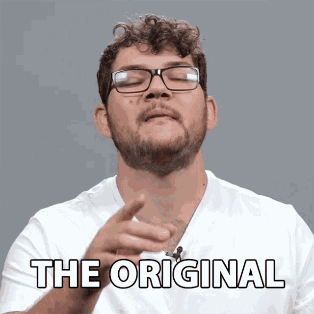 a man wearing glasses and a white shirt says the original in black letters