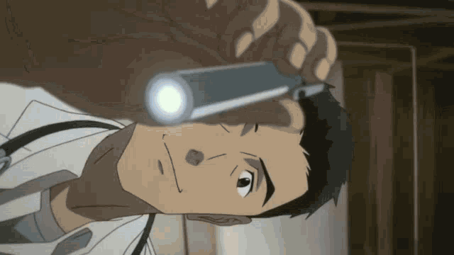 a man in a white coat is holding a flashlight in his hand