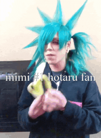 a person with blue hair and the words mimi # 1 hotaru fan on the bottom