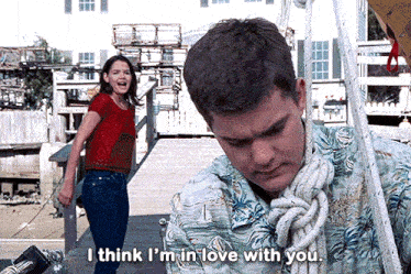 a man with a rope around his neck says i think i 'm in love with you ..