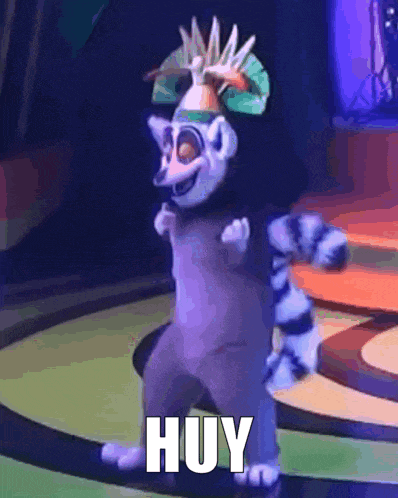 a lemur from madagascar is dancing on a stage
