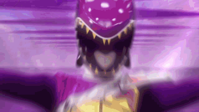 a close up of a person wearing a purple and yellow costume