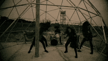 a black and white photo of a band playing instruments