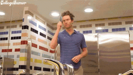 a man brushing his teeth in a bathroom with college humor written on the bottom right