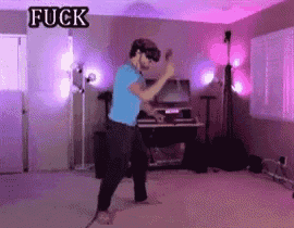 a man wearing a virtual reality headset is dancing in a room with the word fuck written above him