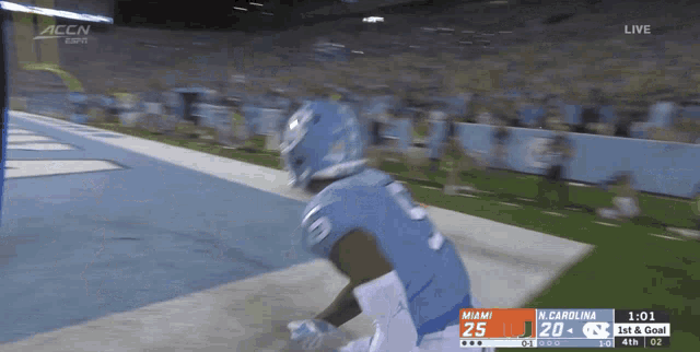 a football game between miami and north carolina is live