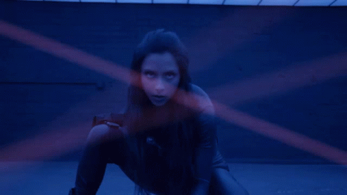 Avoiding The Lasers Michelle Khare GIF - Avoiding The Lasers Michelle Khare Roll GIFs