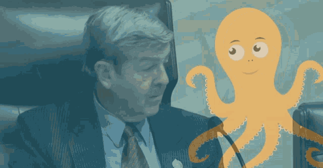 a man in a suit sits next to an octopus
