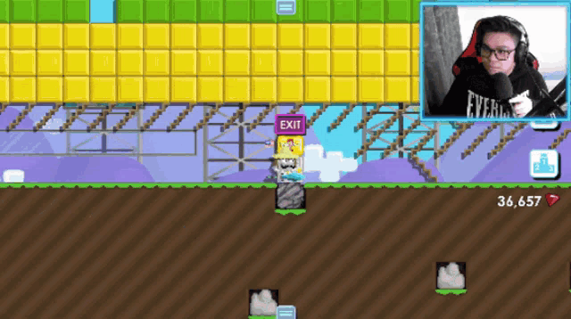a man is playing a video game with the number 36,657 on the screen