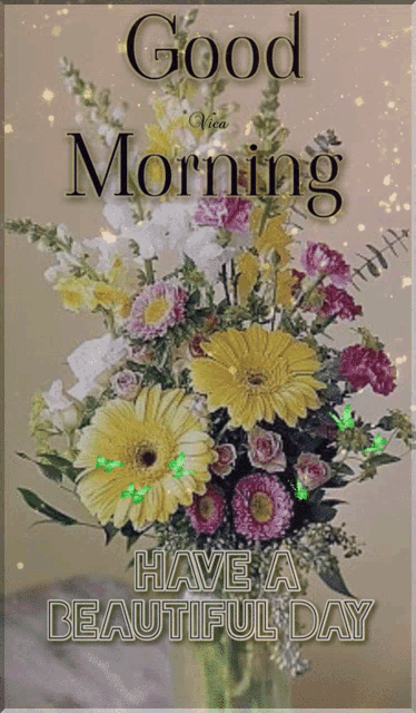 a bouquet of flowers with the words good morning have a beautiful day below it
