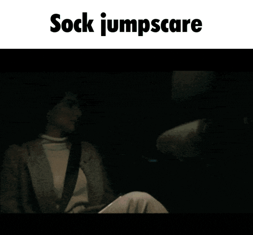 someone is holding a picture of a cartoon character with the words sock jumpscare above it