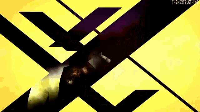 a person is laying on a bed with a yellow and purple striped background .