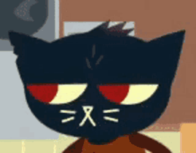 a close up of a cartoon cat with red eyes and a smiley face .