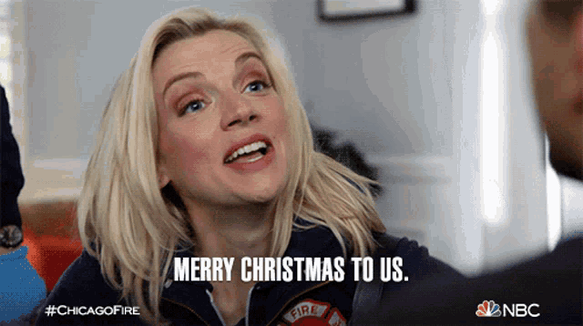 a woman says merry christmas to us in a nbc ad