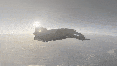 a fighter jet is flying over a snow covered mountain
