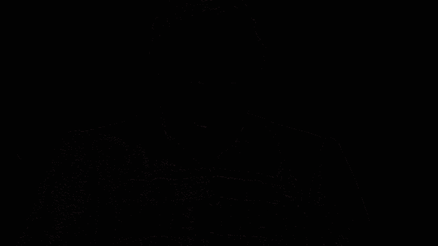a man in a military uniform says " i hate surprises " in a dark room