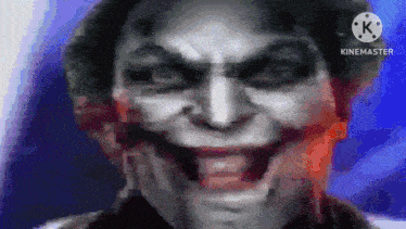 a close up of a joker 's face with the words kinemaster at the top