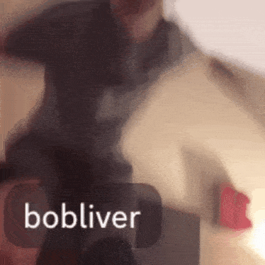 a blurry picture of a person with the name bobliver on the bottom right