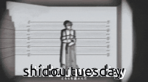 a black and white photo of a man with the words shidou tuesday below him
