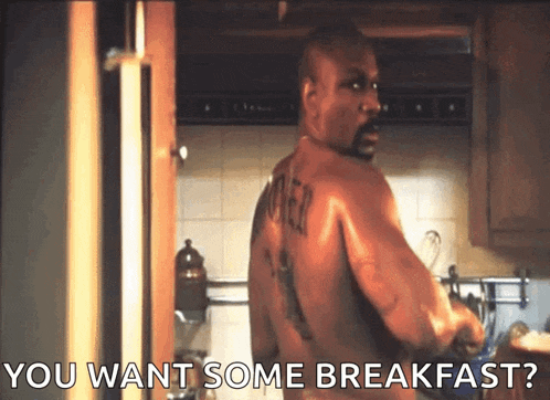 a shirtless man in a kitchen with the words you want some breakfast