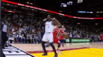 a basketball player with the number 3 on his jersey is dancing