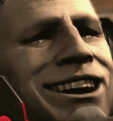 a close up of a man 's face smiling while wearing a mask .