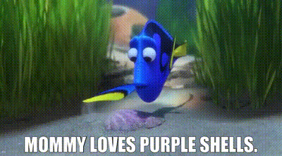 dory from the movie finding dory is swimming in the water .