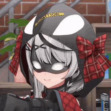 a girl wearing a mask and a hood with the word caution on it