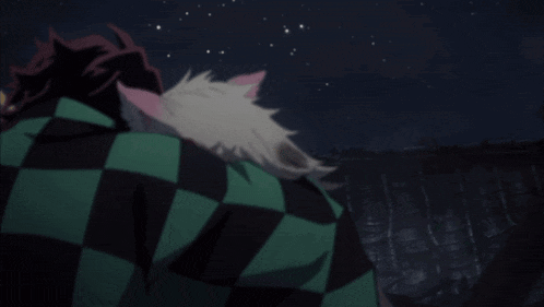 a man in a black and green plaid shirt stands next to another man in a white mask