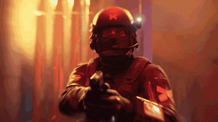 a pixelated image of a man holding a gun with a red star on his helmet