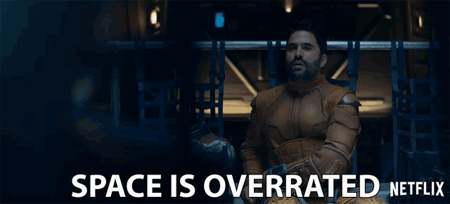 a man in a space suit says space is overrated on netflix