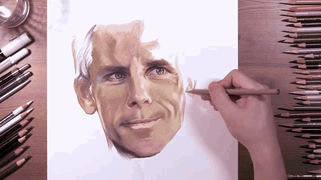 a person is drawing a man 's face with colored pencils including one that says ' prismacolor ' on it