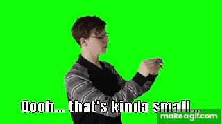 a man is measuring something with a tape measure on a green screen and says `` that 's kinda small '' .