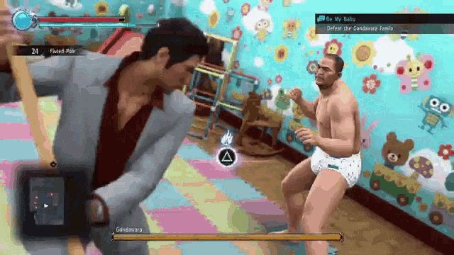 a man in a diaper is playing a video game called be my baby