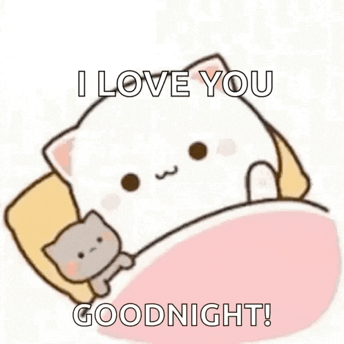 a cartoon cat is laying in a bed with a pillow and saying `` i love you goodnight ! ''
