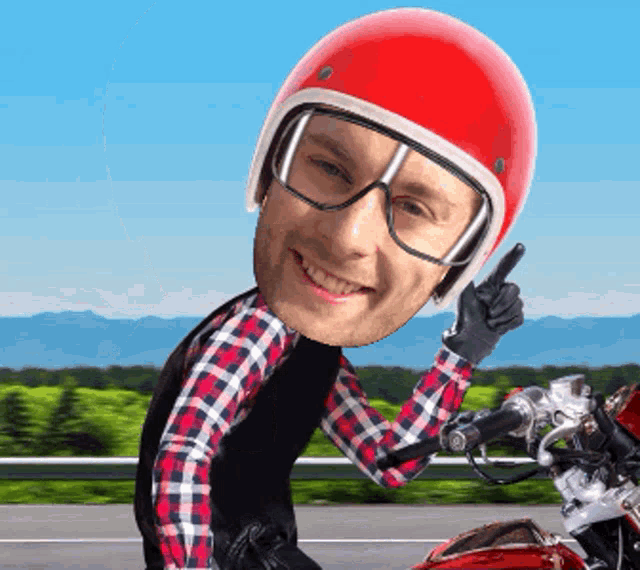 a man wearing a helmet and glasses is riding a motorcycle