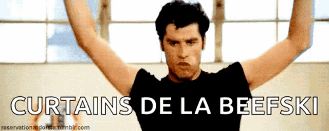 a man with his arms in the air with the words curtains de la beefski above him