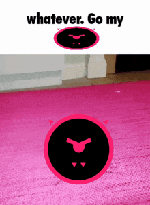 a pink rug with a black circle with a devil face on it and the words whatever go my