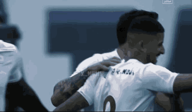 a soccer player with the number 2 on his jersey