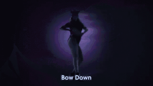 a close up of a woman 's mouth with the words bow down written above it