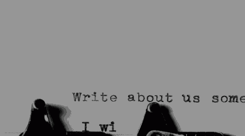 a typewriter is being used to type the words `` write about us somet '' .