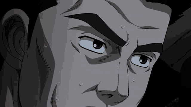 a close up of a man 's face with sweat coming out of his nose and mouth