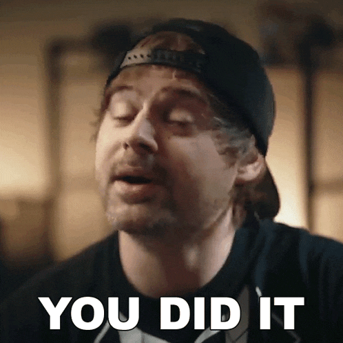 a man wearing a black hat and a black shirt says you did it
