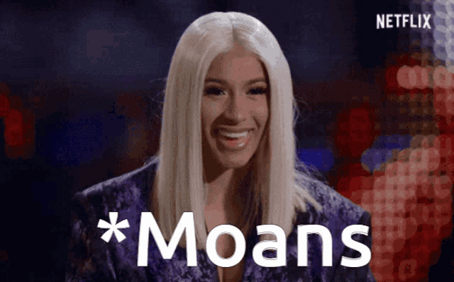 a woman in a purple jacket is smiling with the word moans on the bottom