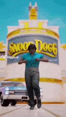 a woman is dancing in front of a sign that says snoop dogg